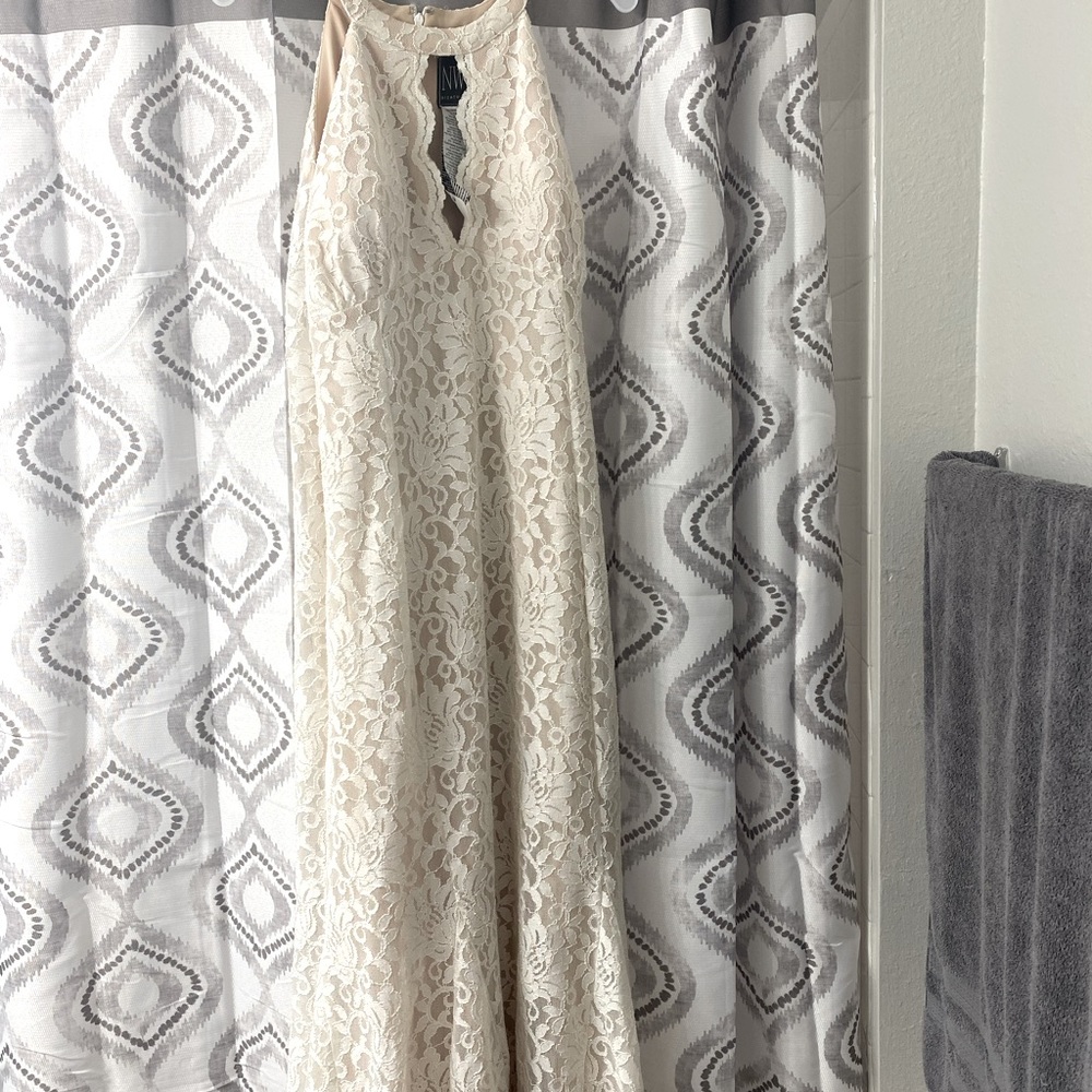White lace layer with a tan/beige under layer formal gown, prom wedding dress